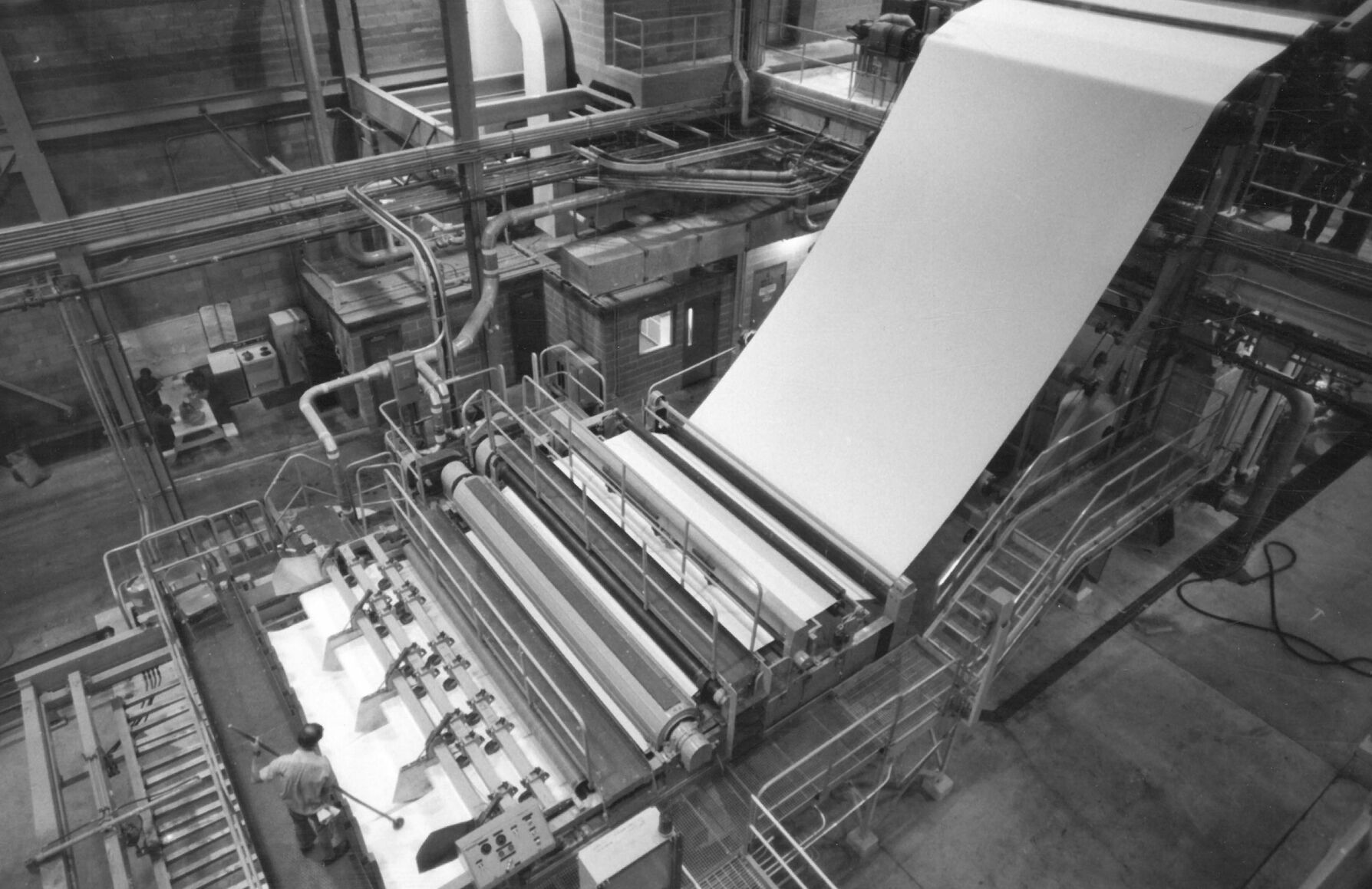 Fresh pulp in a sheet 170 inches wide comes off one of two finishing machines at Scott Paper Company's then-new, $220-million pulp mill near Winslow, Maine.